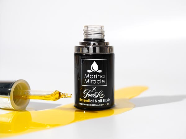 Nail oil bottle with flowers